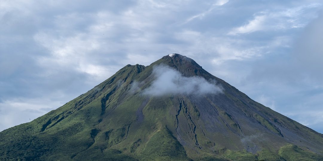 | Get to Know | get-to-know-el-salvador.jpg | Volcanic Cone (unclaimed) | A symmetrical volcanic cone with a wisp of cloud at its peak