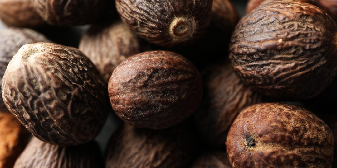 Close-up of whole nutmeg seeds