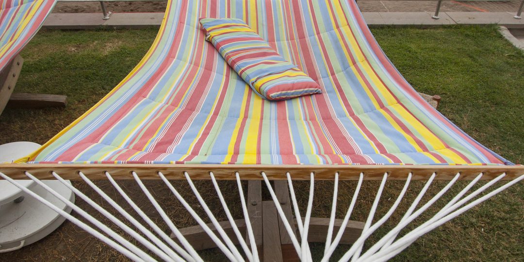 Close-up of a colorful woven striped hammock