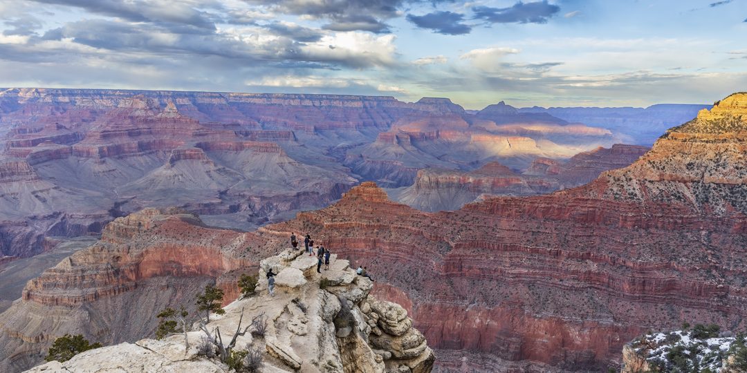 Sweeping view of the layered red rock cliffs of the Grand Canyon